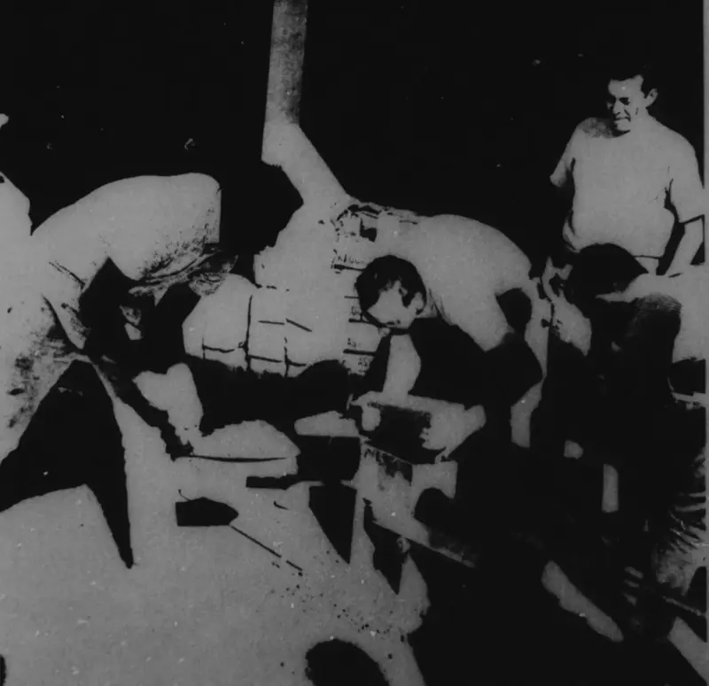 From the thesis, an image depicts the students working on some of the original earth blocks.
