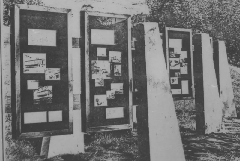 A photograph of the original display boards at the entrance, now removed.