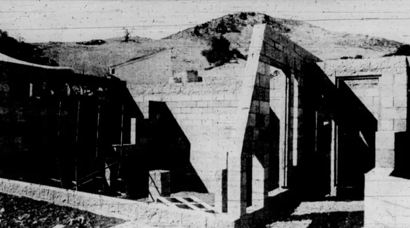 A newspaper clipping of the greenhouse's construction in 1984.