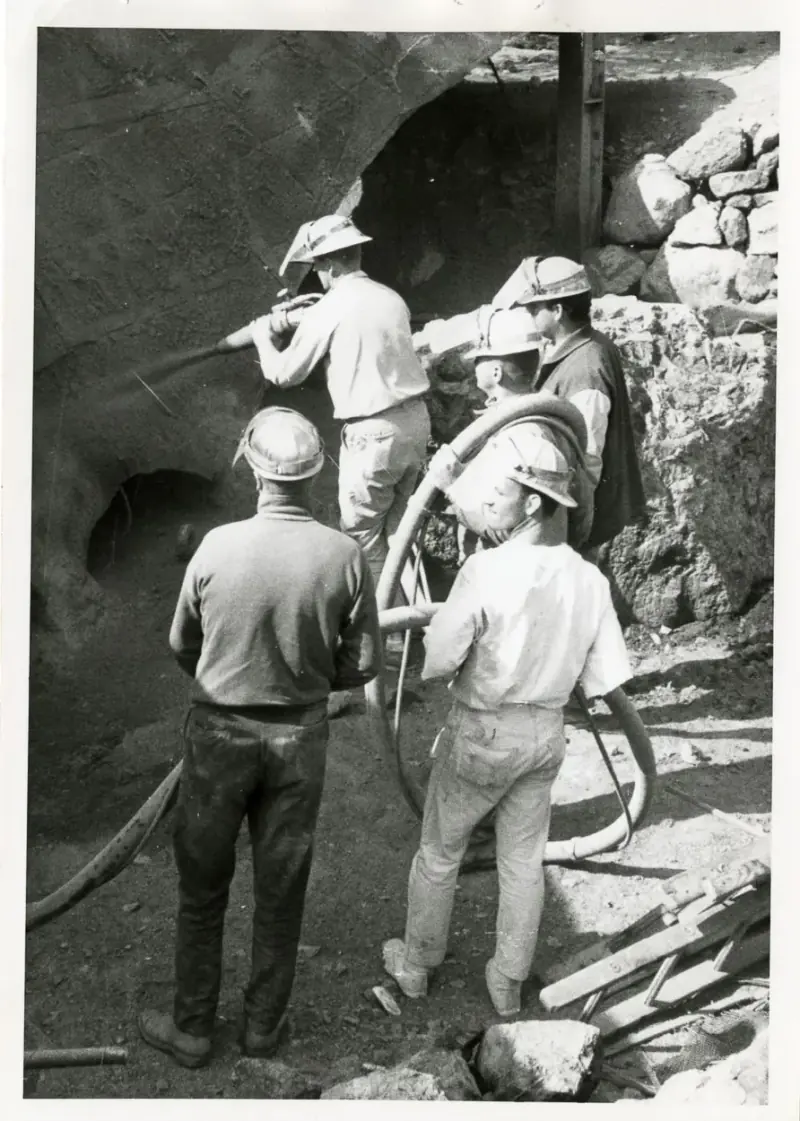 Another angle of the concrete spraying process.