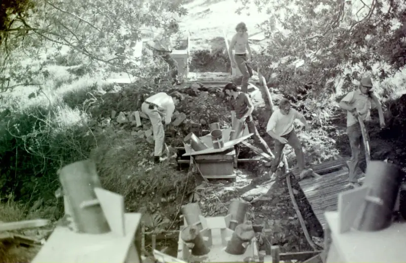 Thesis-era photo of concrete being poured for the base.