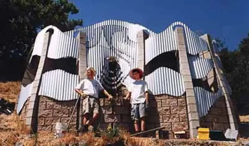 Builders posing in front of the completed 1998 expansion.